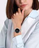 women wearing metal chain analog watch for women
