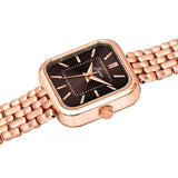 Rose gold watch with a black face