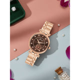 Jainx brown dial rose gold bracelet watch for women on pastel background