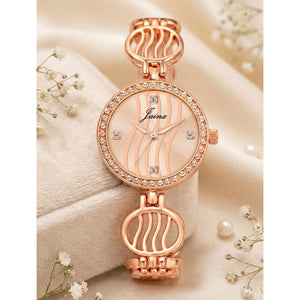 Jainx crystal studded rose gold bracelet watch for women on elegant background