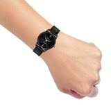 women wearing jainx watch on her wrist